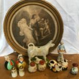 A collection of ceramic salt and pepper pots together with a Leeds classical creamware cow creamer