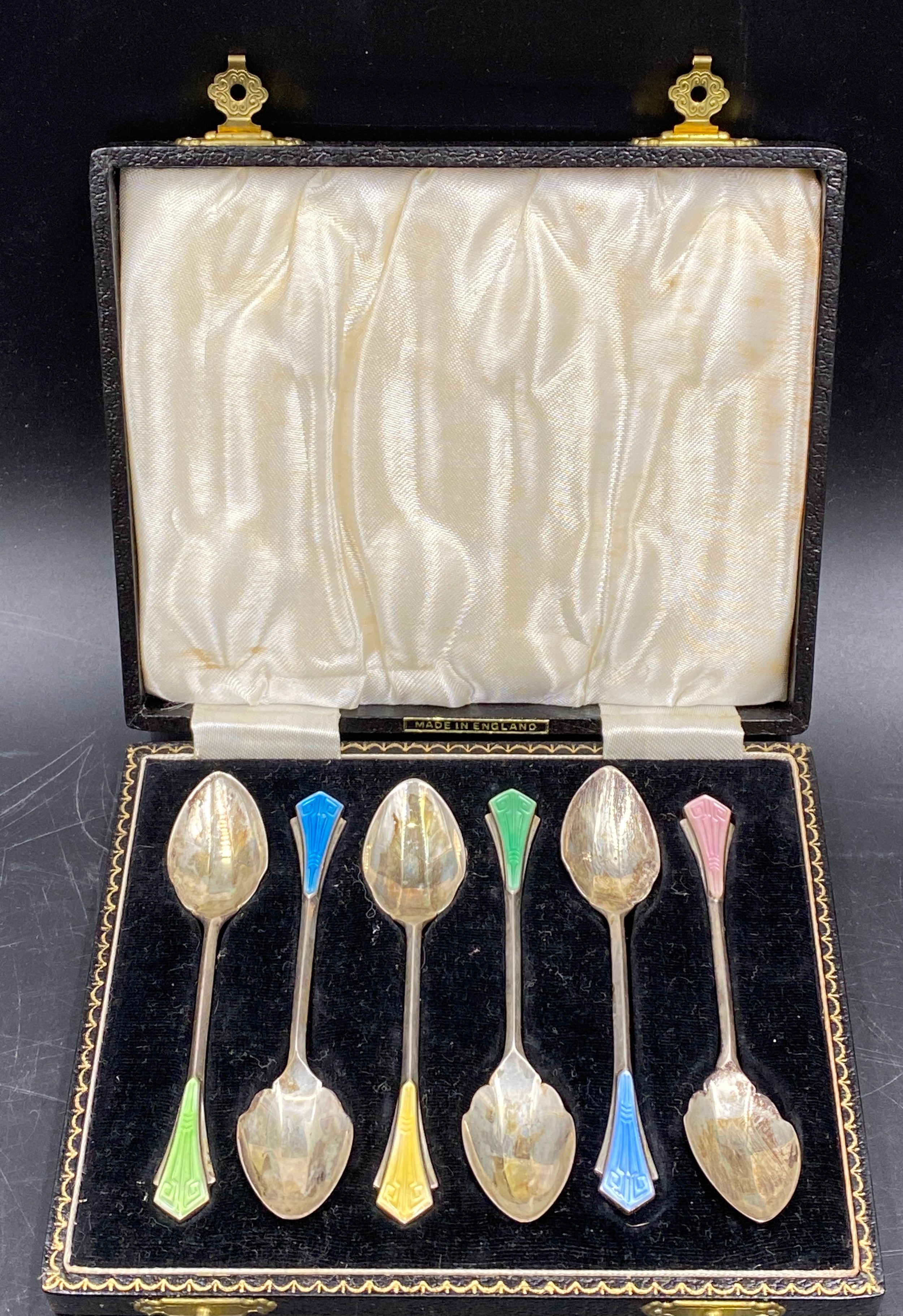 Cased silver and enamel coffee spoons Birmingham 1955 maker Henry Clifford Davis. Total spoon weight