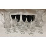 A quantity of glass to include 8 x black and clear glass wine glasses 22.5cms h, large cut glass