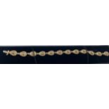 A diamond set bracelet in 14ct yellow gold total, diamond weight 3.04cts. Brilliant round cut