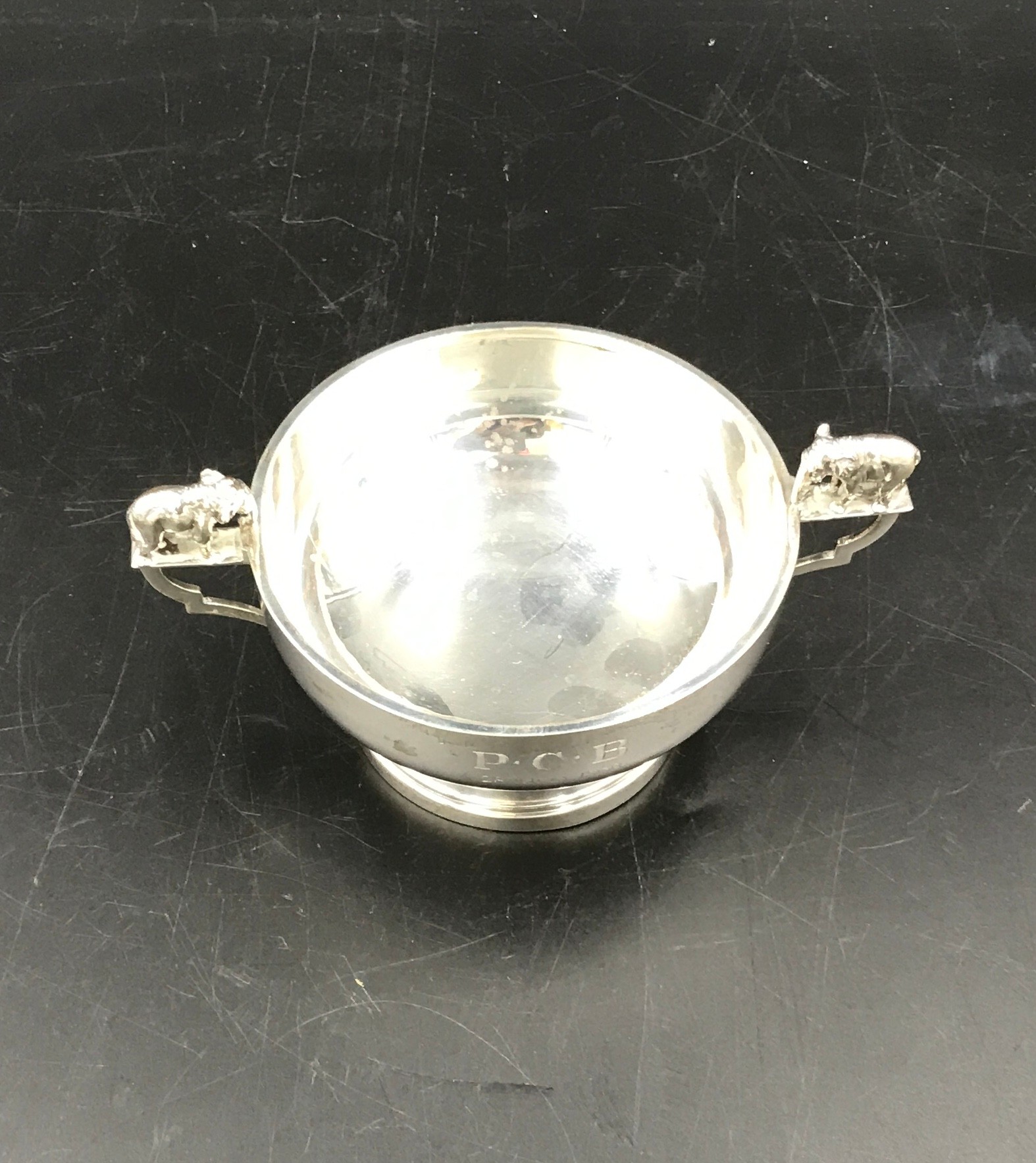 A silver two handled dish with elephant to handles and engraving 'P.C.B 28th July 1938'. - Image 2 of 4