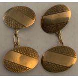 9ct gold cufflinks with engine turned decoration.Condition ReportGood condition.