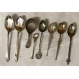 A collection of 8 silver spoons of various design and shape, and various hallmarks including caddy