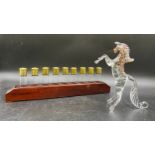 A novelty numbered peg finder for game shooting, shot glasses in the shape of cartridges with "