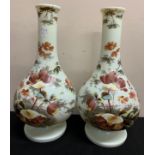 Two 19thC milk glass hand painted vases. 39cms h.Condition ReportGood condition.