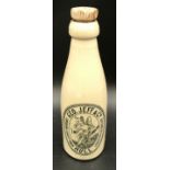 A very rare Geo Jeff & Co. Hull Imp brand ginger beer bottle. Printed with imp sat on a mushroom