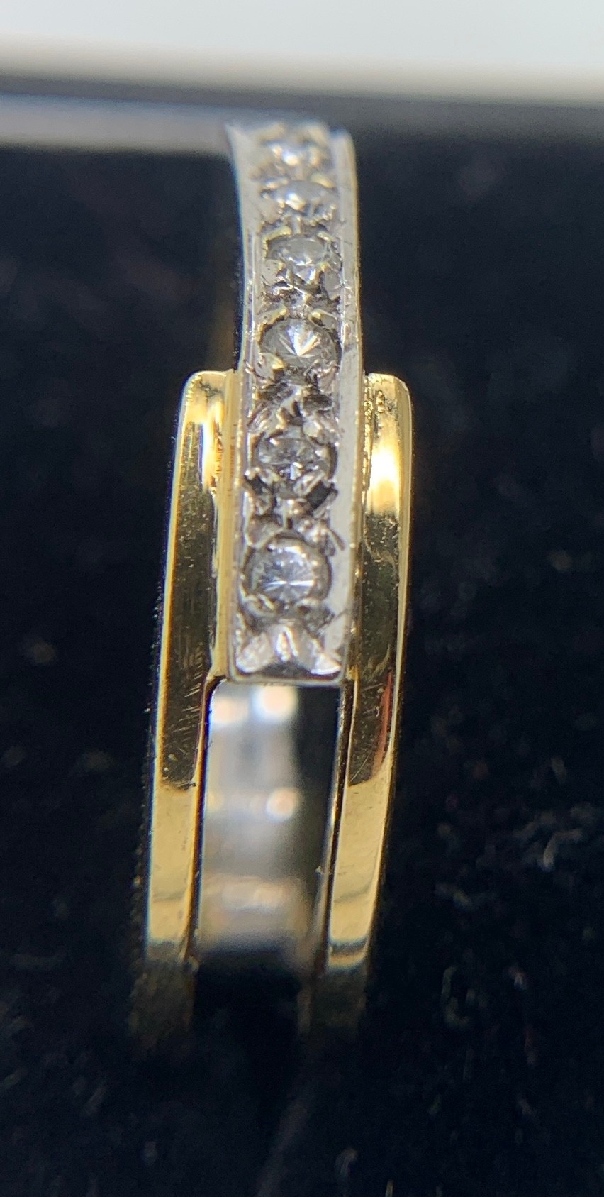 An 18ct white and yellow gold ring set with 8 diamonds. Size M, 6.2gms.Condition ReportGood - Image 2 of 3
