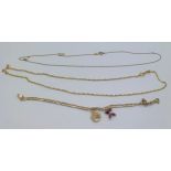 Two fine 9ct gold chain necklaces together with a 9ct gold chain bracelet with 2 charms. 3.6gms