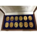 Danbury Mint cased set of 12 x 925 Sterling silver gold plated ingots. Prince Andrew and Sarah