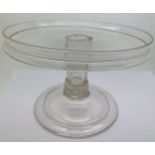 A Georgian glass tazza with a circular galleried top, a generously moulded and collared stem and a