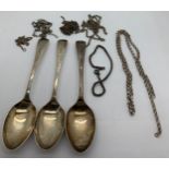Three silver spoons and a quantity of silver and white metal chains. 78gms.Condition ReportChains