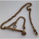A 9ct gold watch chain, T bar and fob. Each link marked 9ct. Total weight 31.2gms. Length 38cms.