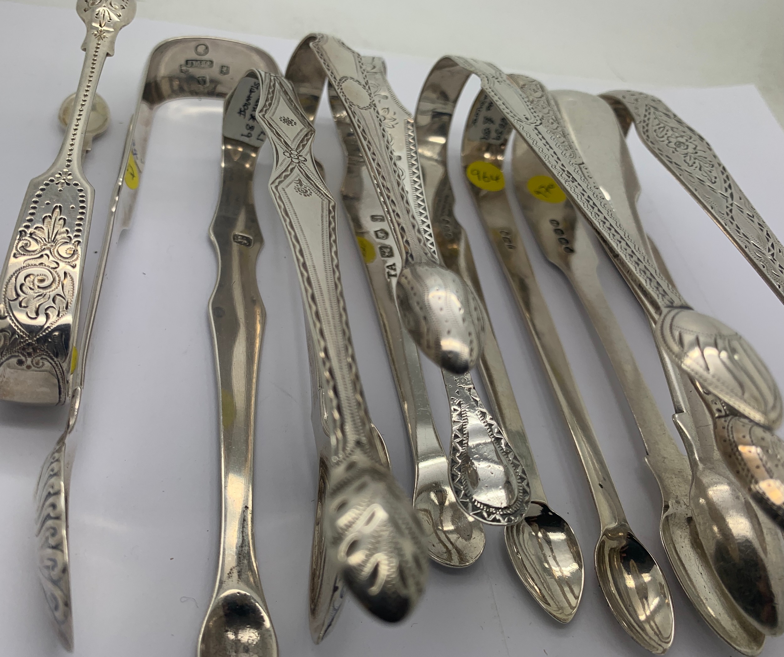 A collection of 15 good quality silver sugar tongs to include: Stephen Adams London 1793 14cms, - Image 4 of 16