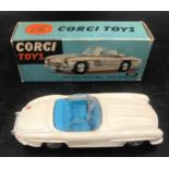 Corgi toys 303 Mercedes Benz 330sl open roadster, boxed.Condition ReportFairly good condition,