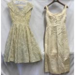 Two handmade 1950's dresses, one cream with metallic patterned thread, lined with square neck and