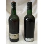 A bottle of Cockburn Vintage Port 1960 and an unknown bottle of port with white paint to base and