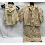 A 1950's Morvic dress and jacket with lace overlaid silk style polyester and a cream crochet cape