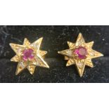 9ct gold diamond and ruby set star earrings. 1.7gms weight.