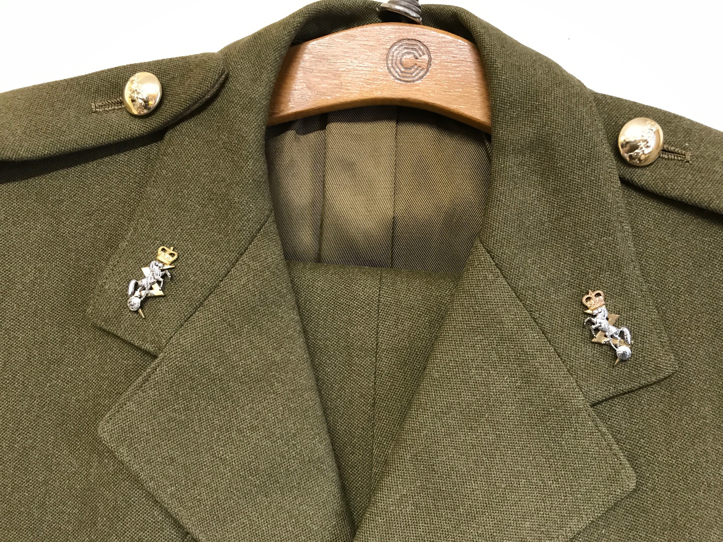 A British military uniform bearing the insignia of the Royal Electrical and Mechanical Engineers. - Image 3 of 6