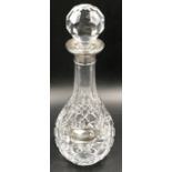 Cut glass silver mounted decanter B and Co, Birmingham 1998, 32cms h and a silver decanter label,