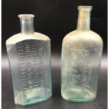 Two rare aqua green glass medicine bottles to include Hull Royal Infirmary bottle, two tablespoons
