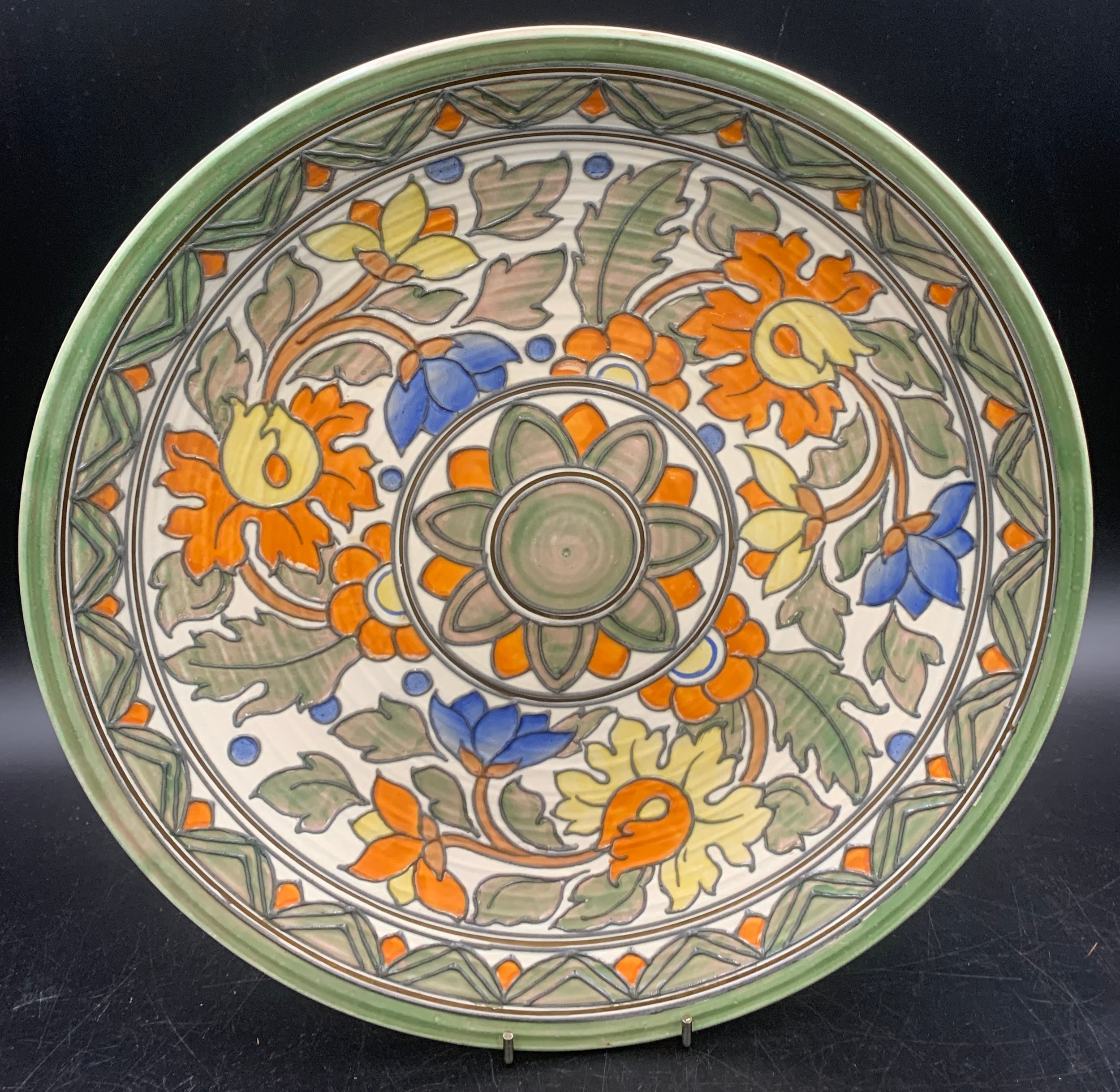 A Crown Ducal Charlotte Rhead "Ankara" pattern charger number 5983, 31cms d together with a - Image 2 of 6