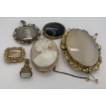 Five 19thC brooches, largest 6.5 x 5cms, one mourning brooch, banded agate, carved shell cameo in
