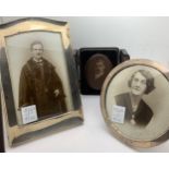 Two hallmarked silver photograph frames , round one Birmingham 1916, 12.5cms d and Birmingham 1919.