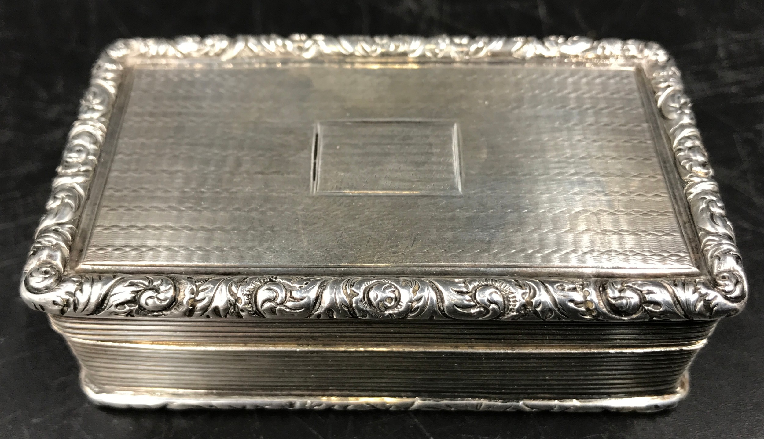 A hallmarked silver snuff box, Joseph Wilmore Birmingham 1834, 7.5cms w x 4.5cms d x 2.5cms h.