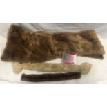 A musquash fur stole, together with 2 fur collars and a boxed mink fur brooch.Condition ReportFair
