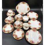 A selection of Royal Albert Country Roses to include cake plate 26cms d, 12 plates 21cms d, 6 side