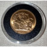 George V 1920 full Gold Sovereign in capsule.Condition ReportVF.