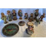 A mixed lot of 9 Hummel figurines. Tallest 14cms h. 2 compacts, small Imari jug, 6cms h and