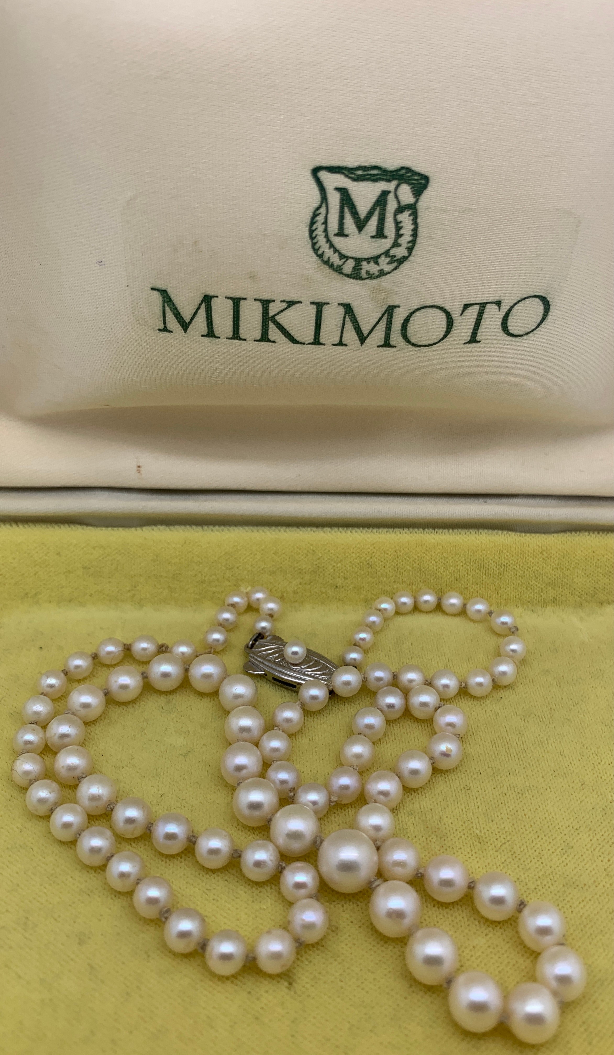 A Mikimoto single strand necklace of graduated pearls with a white metal clasp. 52cms l.Condition - Image 2 of 4