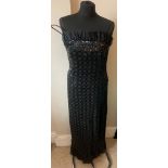 Vintage costume to include black sequinned dress, gold sequinned top, green clearless top, 1980's