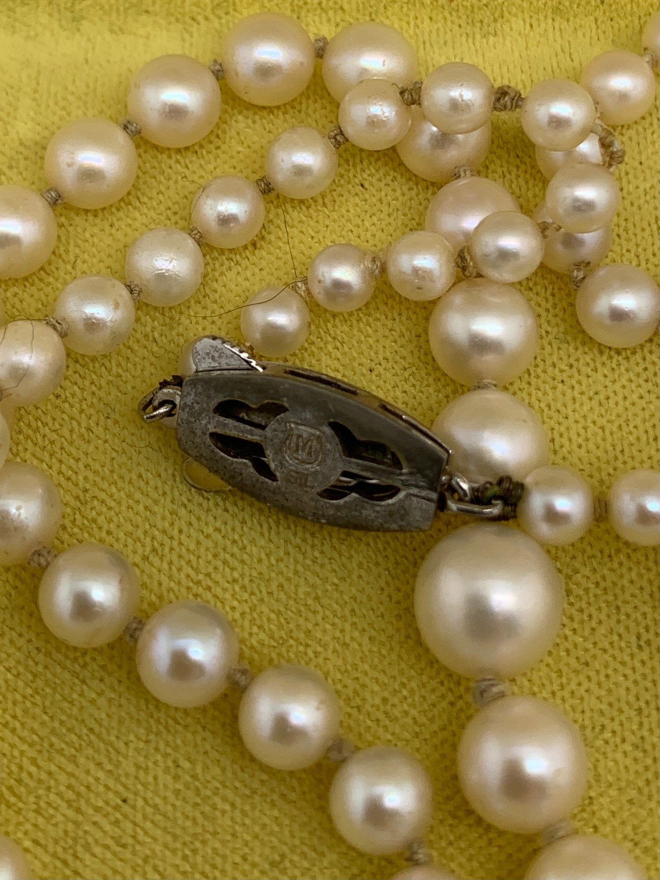 A Mikimoto single strand necklace of graduated pearls with a white metal clasp. 52cms l.Condition - Image 3 of 4