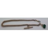 A 9ct gold watch chain and fob 33cms l. Total weight 17.9gms.Condition ReportGood condition.