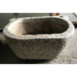 A carved stone watering trough. 82cm w x 57cm d x 36cm h.Condition ReportChip to top front inner