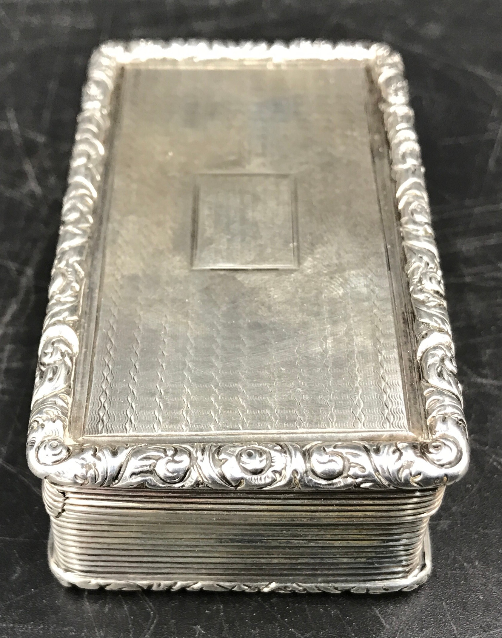 A hallmarked silver snuff box, Joseph Wilmore Birmingham 1834, 7.5cms w x 4.5cms d x 2.5cms h. - Image 5 of 5