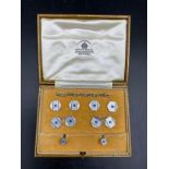 Art Deco cufflinks, buttons and studs set with sapphire. Marked 9ct and 18ct. Maker's mark GAF 10.