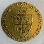A George III gold 1798 spade guinea. Approx. Weight 8.4gms.