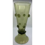 A Bohemian deep wine glass. The trumpet body tapers to a ring knop sat on a deep spiral flared