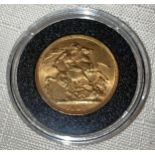 Victoria 1893 full Gold Sovereign in capsule.Condition ReportVF.