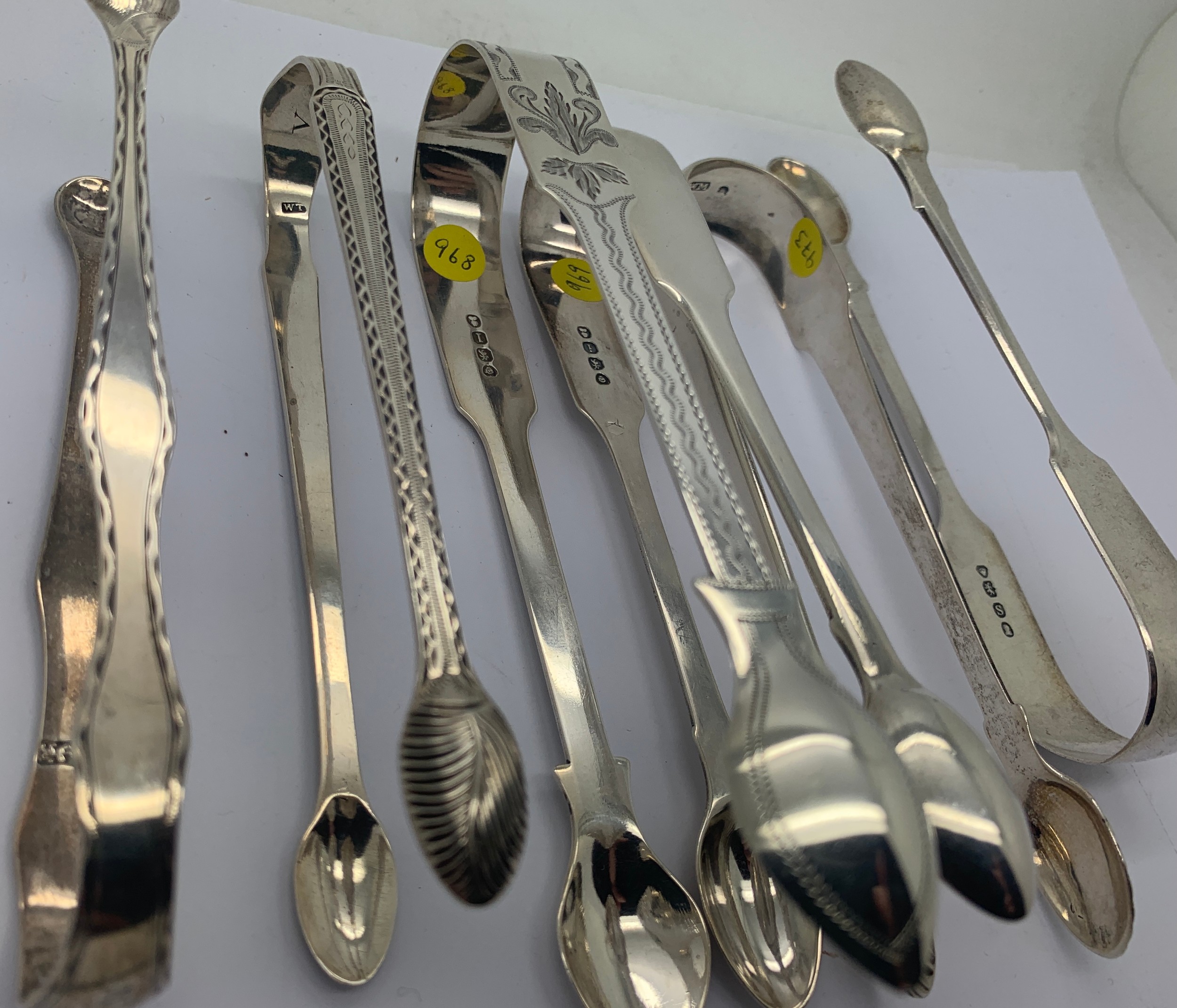 A collection of 15 good quality silver sugar tongs to include: Stephen Adams London 1793 14cms, - Image 7 of 16
