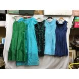 A selection of 5 vintage dresses to include a turquoise silk dress, a green slip or toile, a black