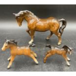 A Beswick horse 15.5cms h together with 2 Beswick foals, 10cms and 8cms h.Condition ReportGood