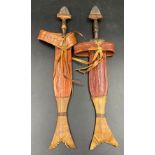 A pair of Kenyan dueling daggers. 43cms l and 44cms l.