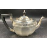 Silver teapot with ebony handle & knop. Chester 1928. 590gms.Condition ReportCrack to knop.