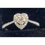 An 18ct white gold heart shaped diamond ring. Size O 2.9gms.Condition ReportGood condition.