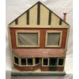 An early 20thC doll's house with 4 rooms. 70cms h x 56cms w x 37cms d.Condition ReportWith dirt